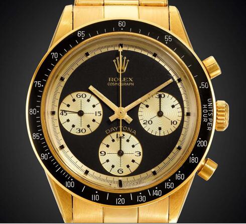 The gold sub-dials are striking on the black dial.