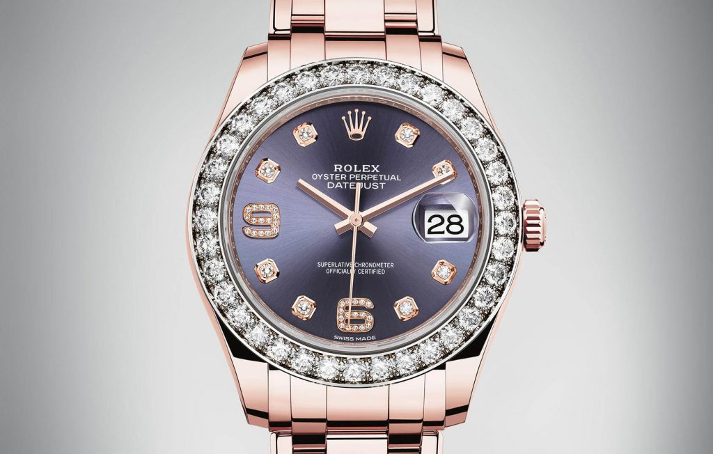 The18ct everose gold fake watch is decorated with diamonds.
