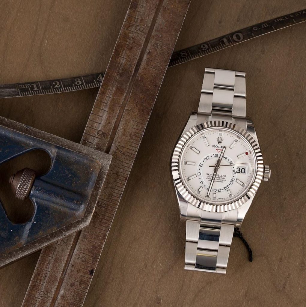 The 42mm replica watch has a white dial.